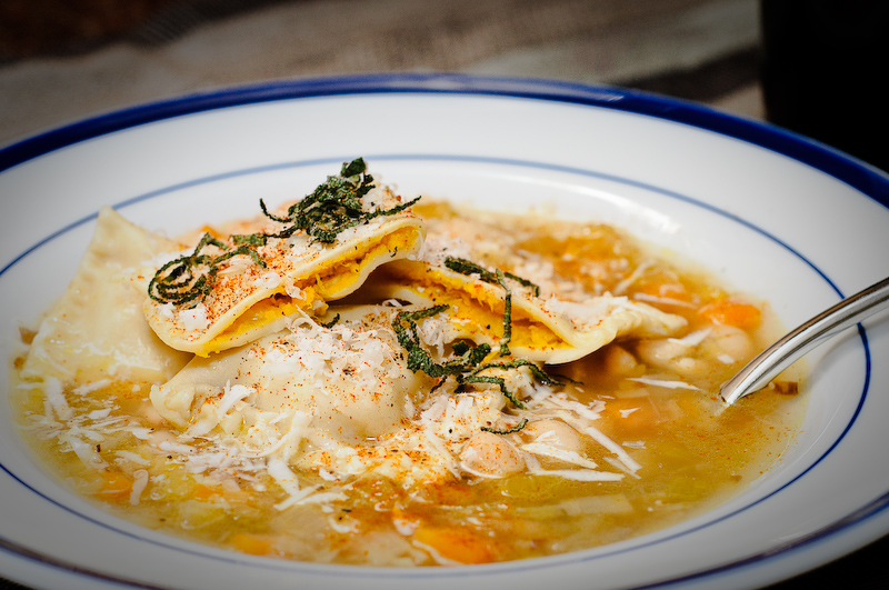 Pumpkin ravioli with a simple vegetable broth and white beans Pumpkin ravioli and vegetable soup